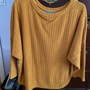 This sweater top is beautiful for winter